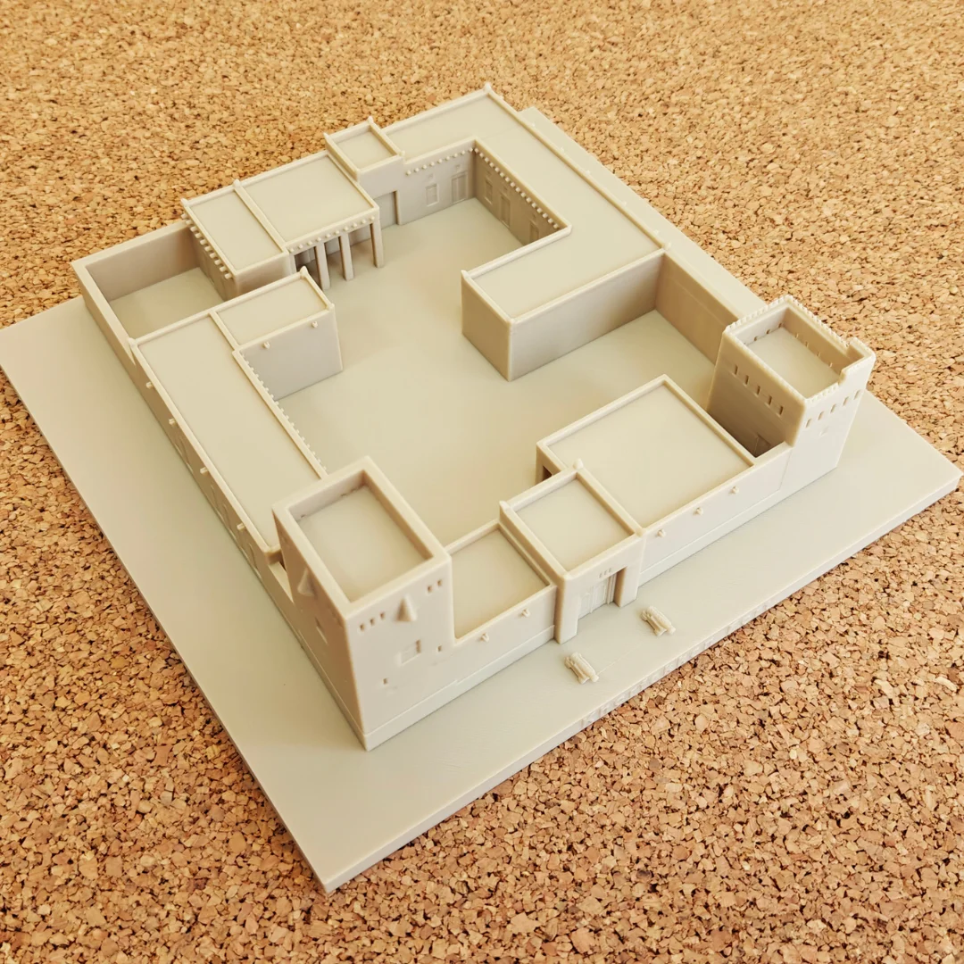 Opposite elevated view of a Khorfakkan Fort model on its square base.