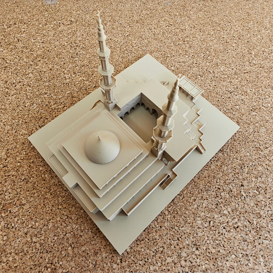 Overhead angled view of a King Faisal Mosque model showing its roof layout.