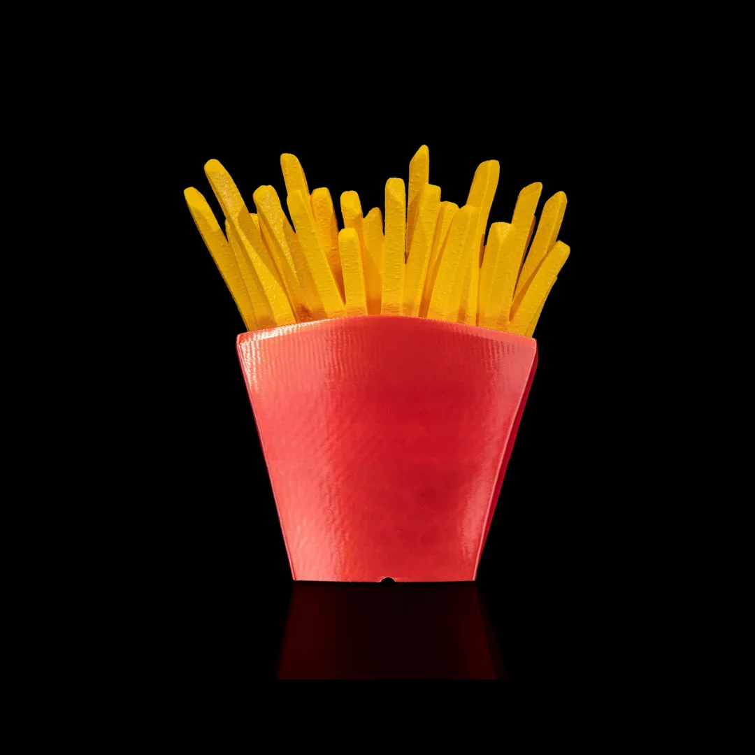 Rear view of a French fries carton phone holder.
