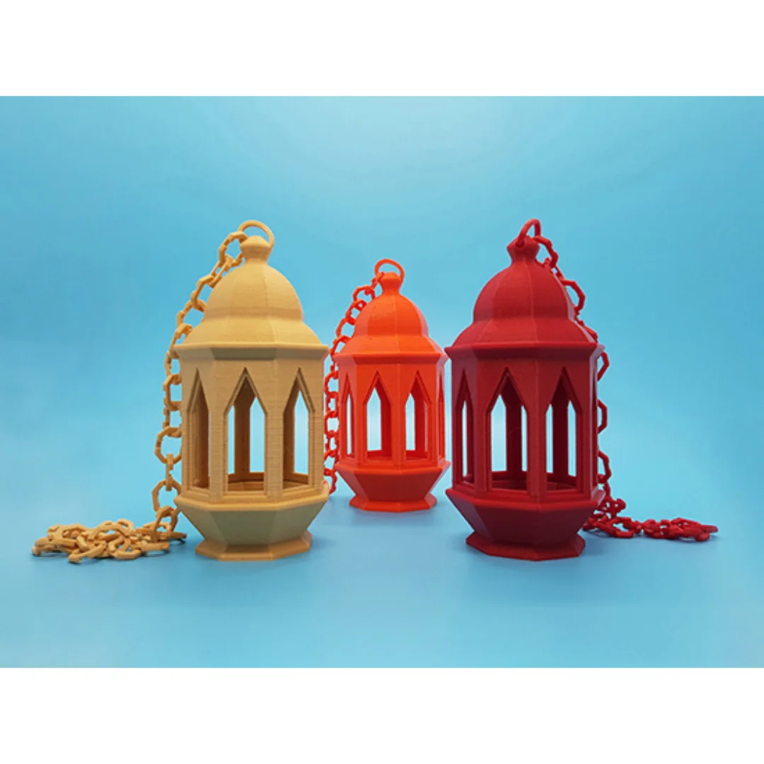 Three 3D printed Ramadan lanterns displayed together with their hanging chains.