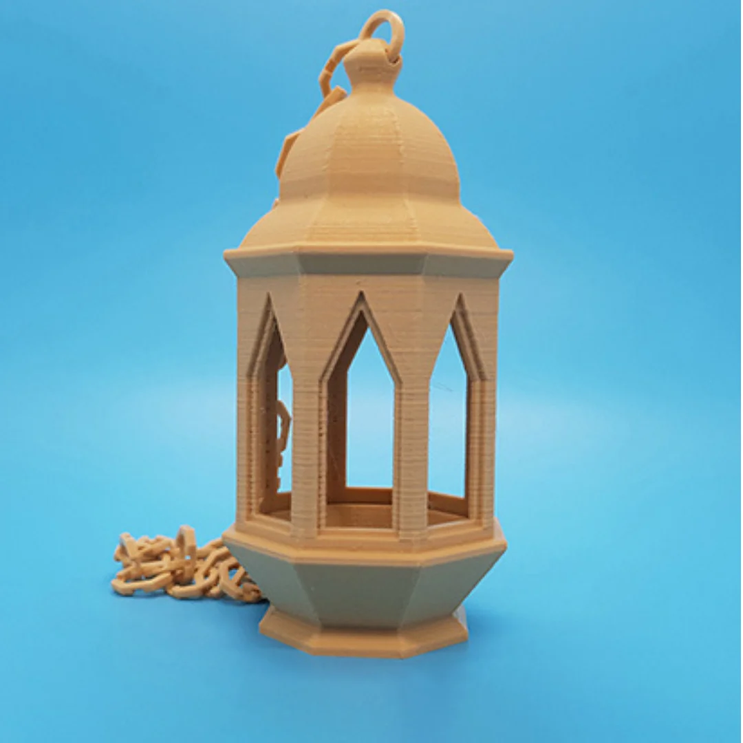 Front detail of a 3D printed Ramadan lantern showing its open arch design and hanging chain.