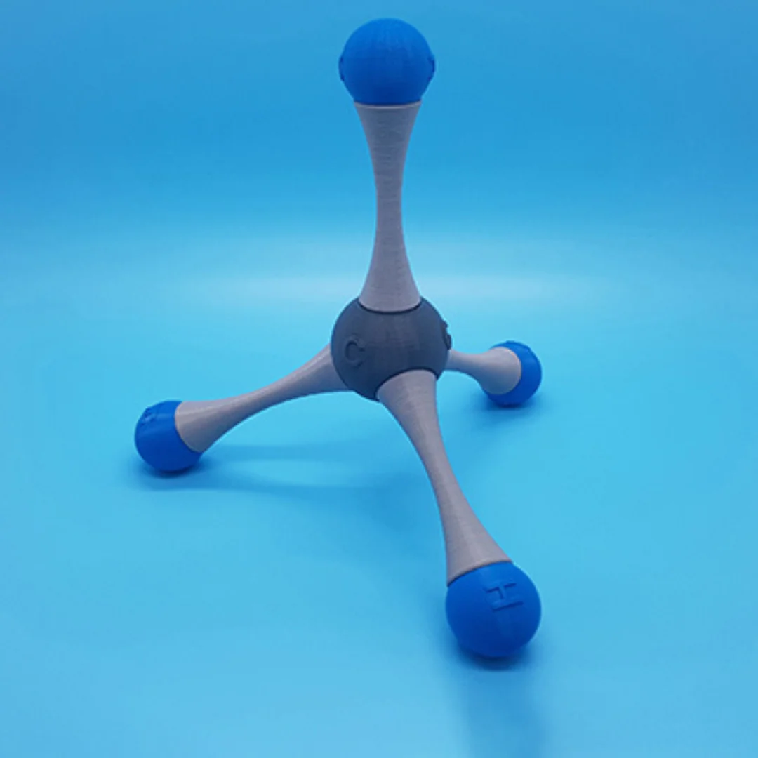 Angled view of a CH4 molecule model with four bonds.