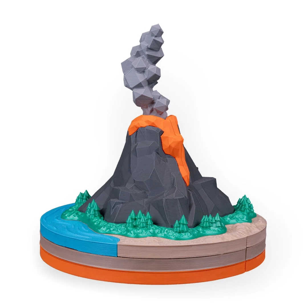 Rear angle of a volcano model showing surrounding terrain and water.