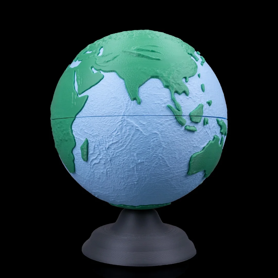 Earth globe model showing Asia on its curved surface.