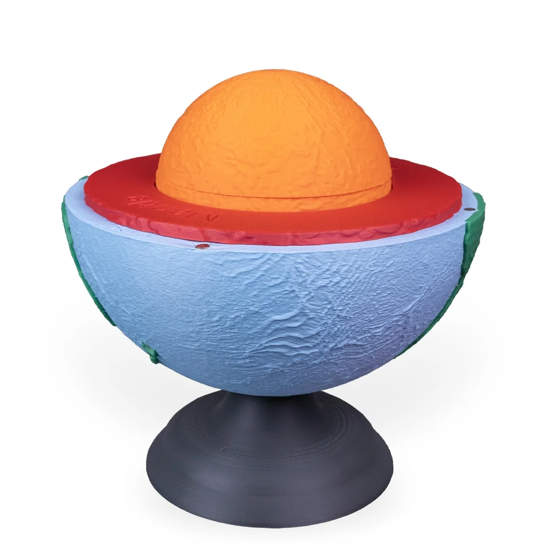 Earth model with nested internal layers exposed above the lower shell.