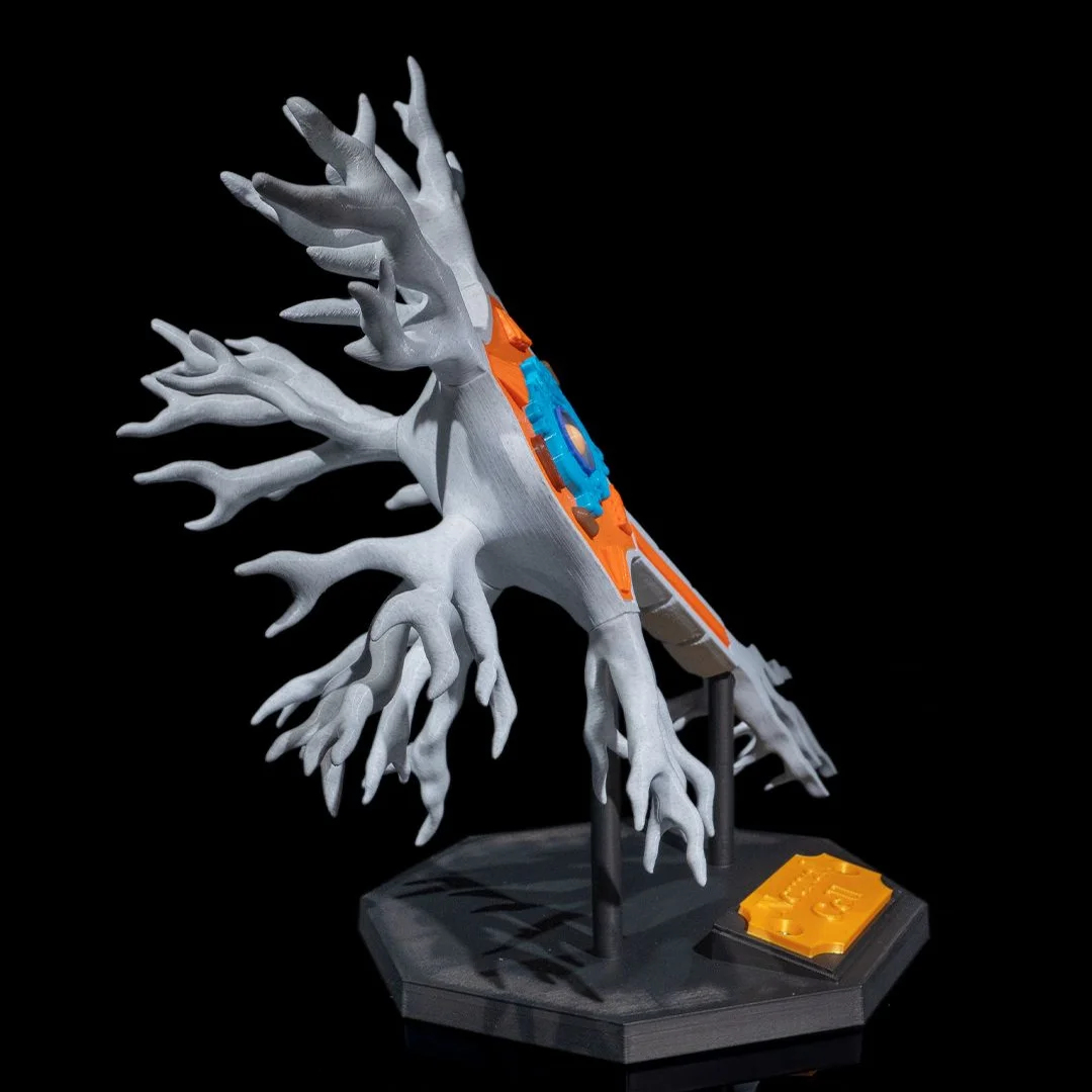 Side view of a neuron model showing its thickness and display stand.