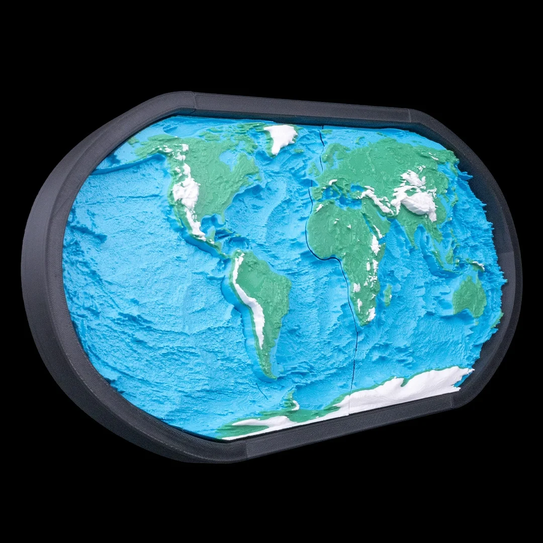World relief map model showing raised continents and ocean floor details in a frame.