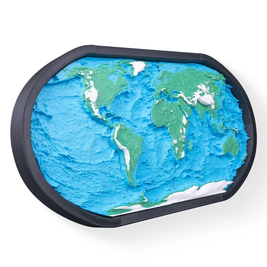 World topographic map model viewed from the left.