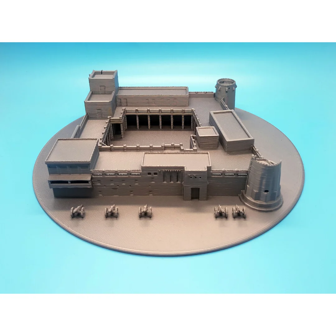 Elevated front view of a Sharjah Fort model showing the courtyard and surrounding rooms.