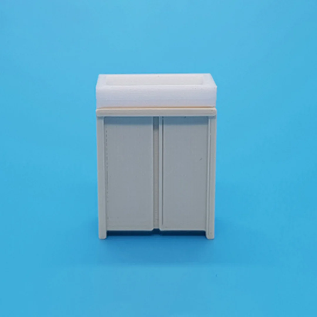 Miniature basin cabinet at 1:50 scale.