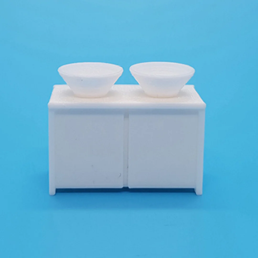 Miniature double basin cabinet at 1:50 scale.