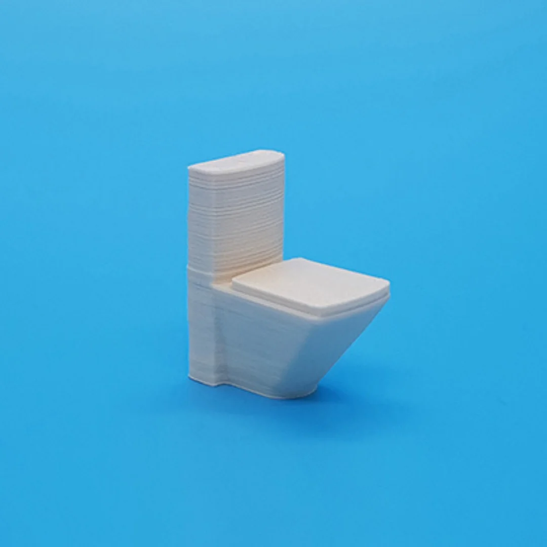 Modern toilet miniature model at 1:50 scale.