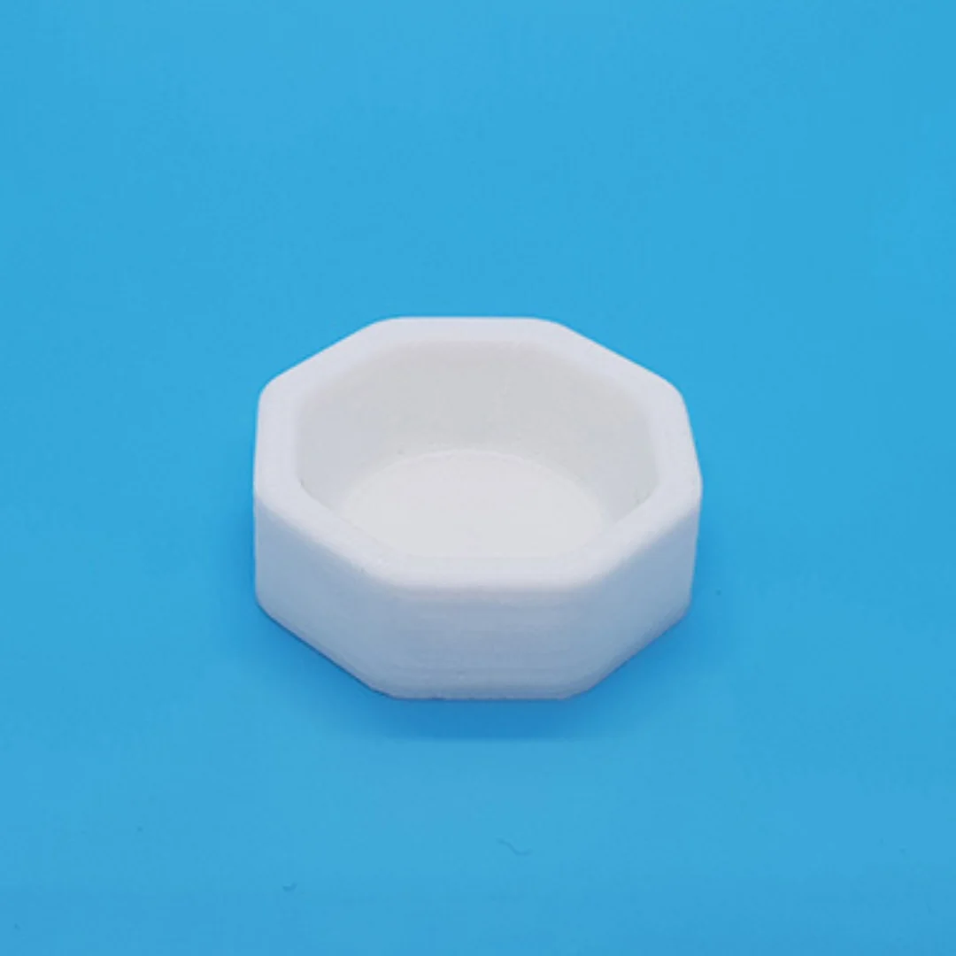 Miniature polygonal bathtub at 1:50 scale.