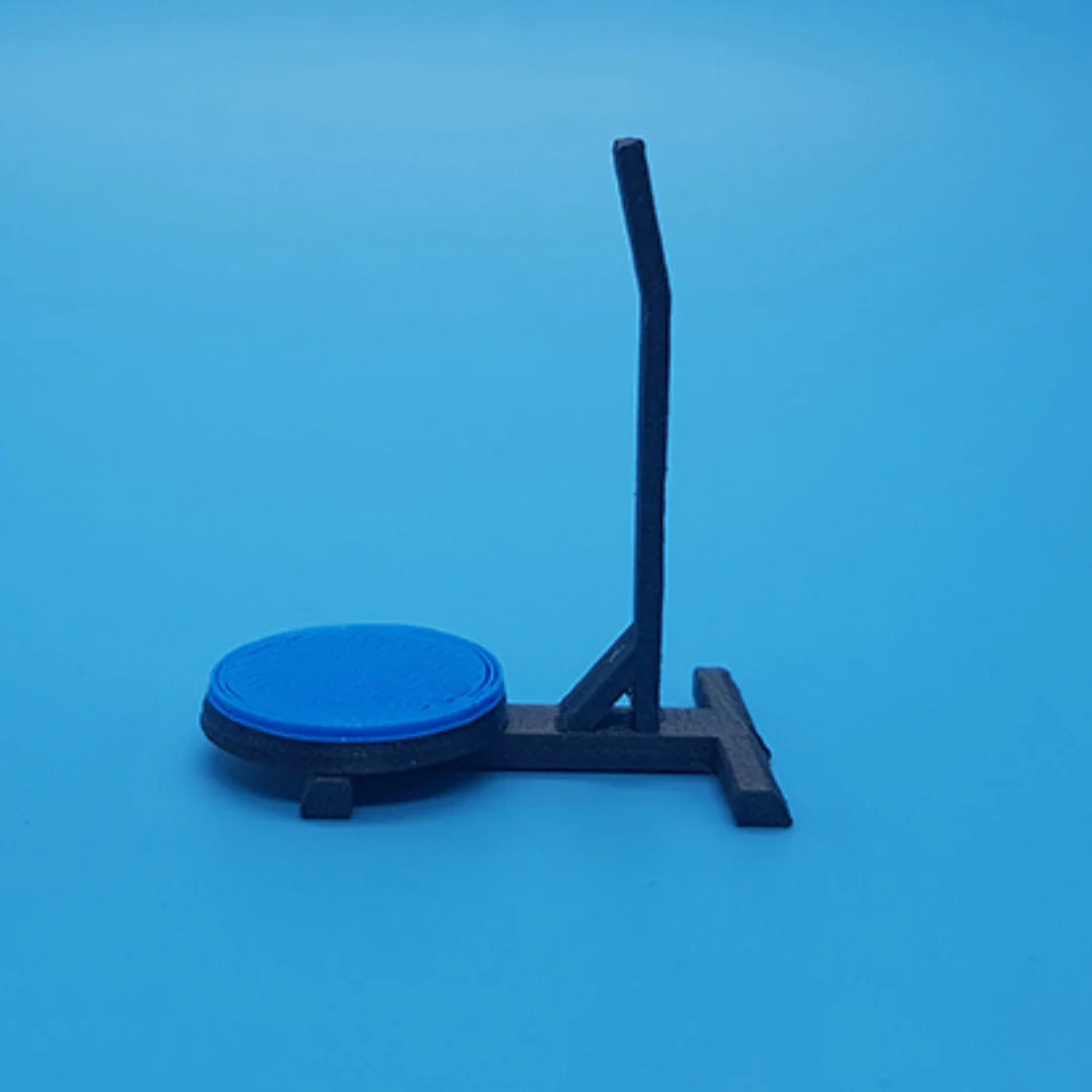 Vibration Plate miniature model viewed from the side at 1:50 scale.