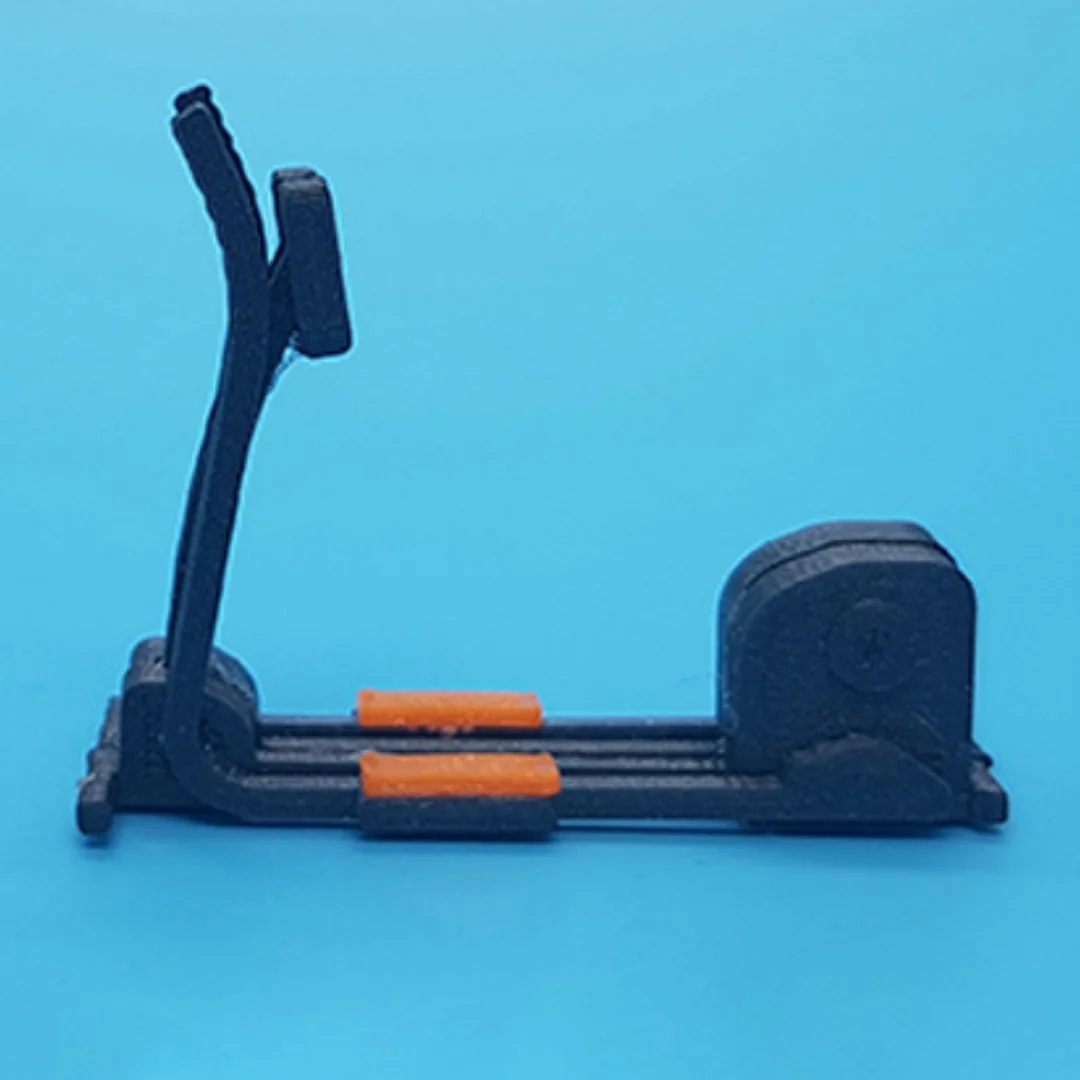 Elliptical exercise machine miniature model at 1:50 scale.