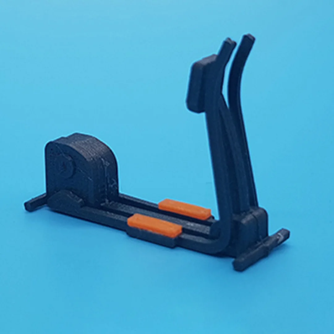 Elliptical exercise machine miniature model at 1:50 scale.