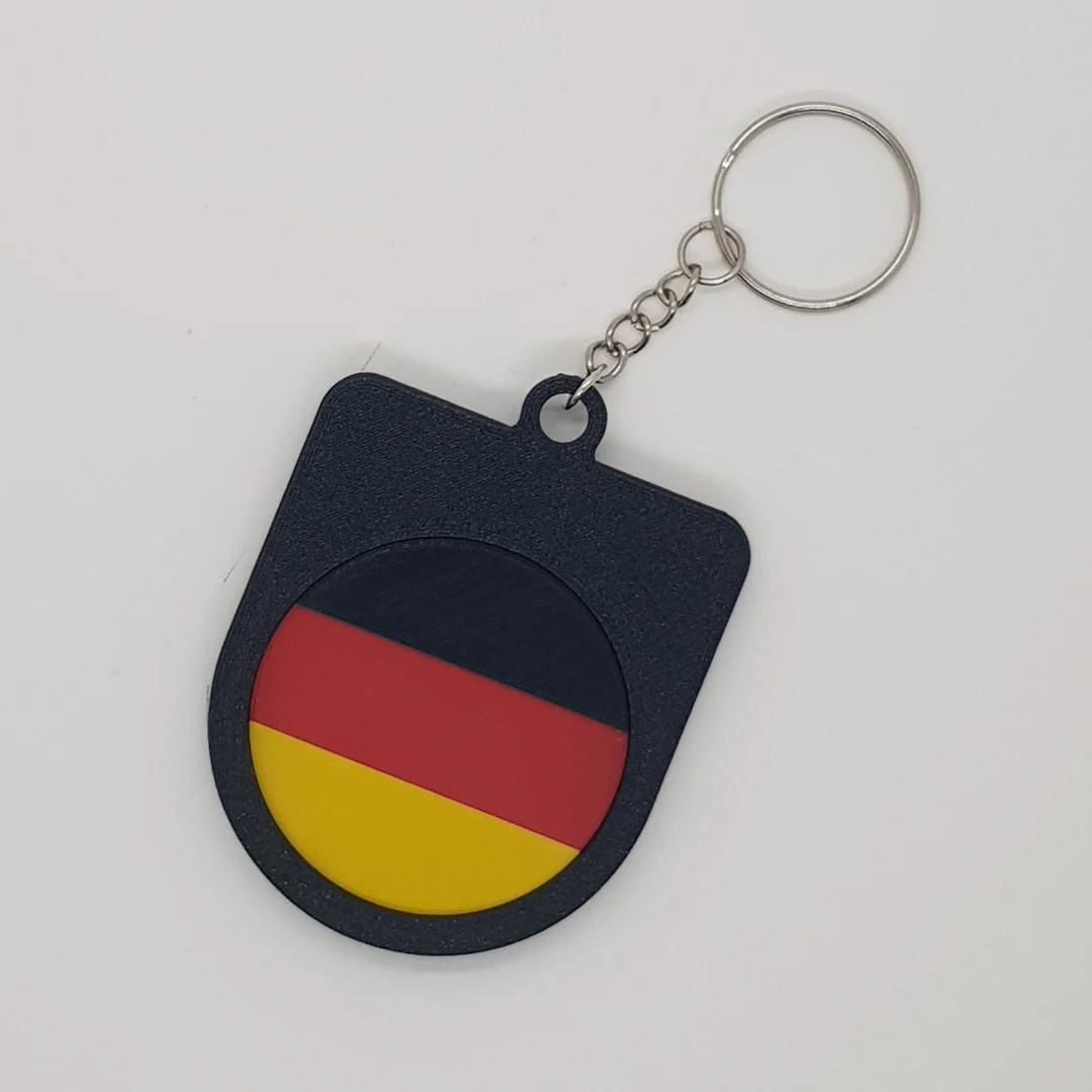 Rear view of a Germany football keychain showing the national flag.