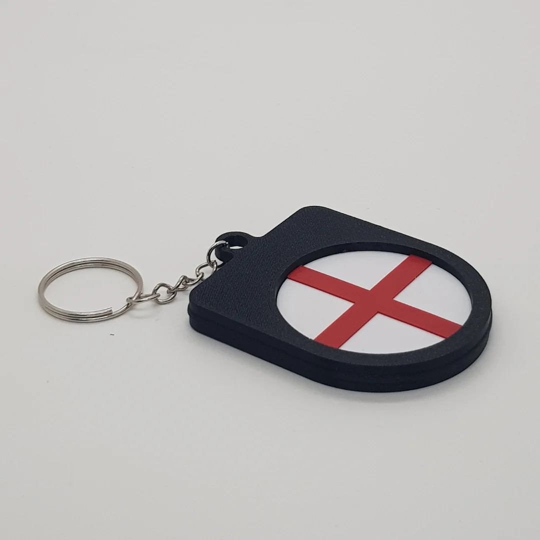 Angled rear view of the England football keychain showing the national flag inset.