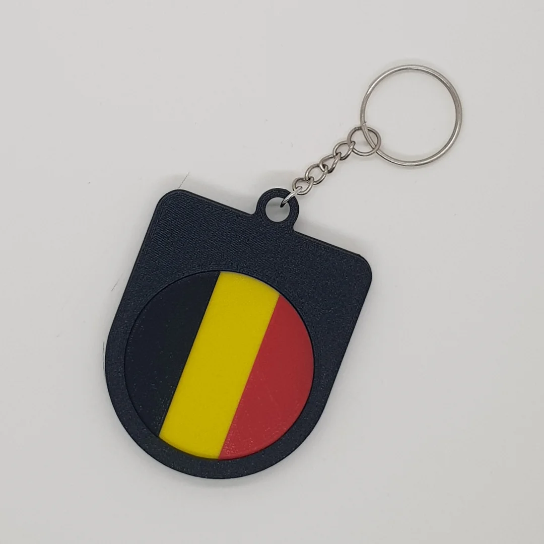 Rear view of the Belgium football keychain showing the national flag.