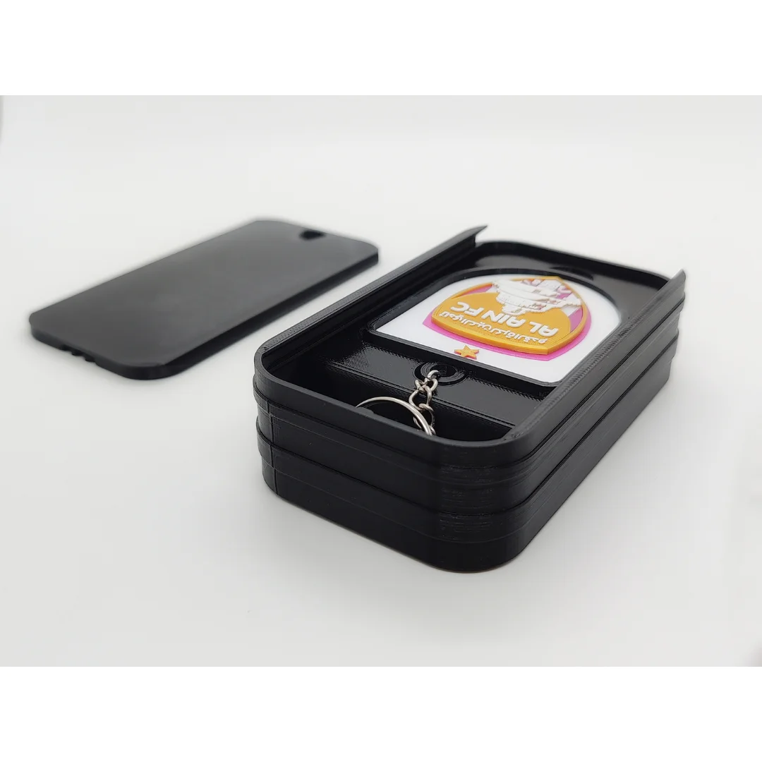 Al-Ain FC keychain displayed inside an open presentation box.
