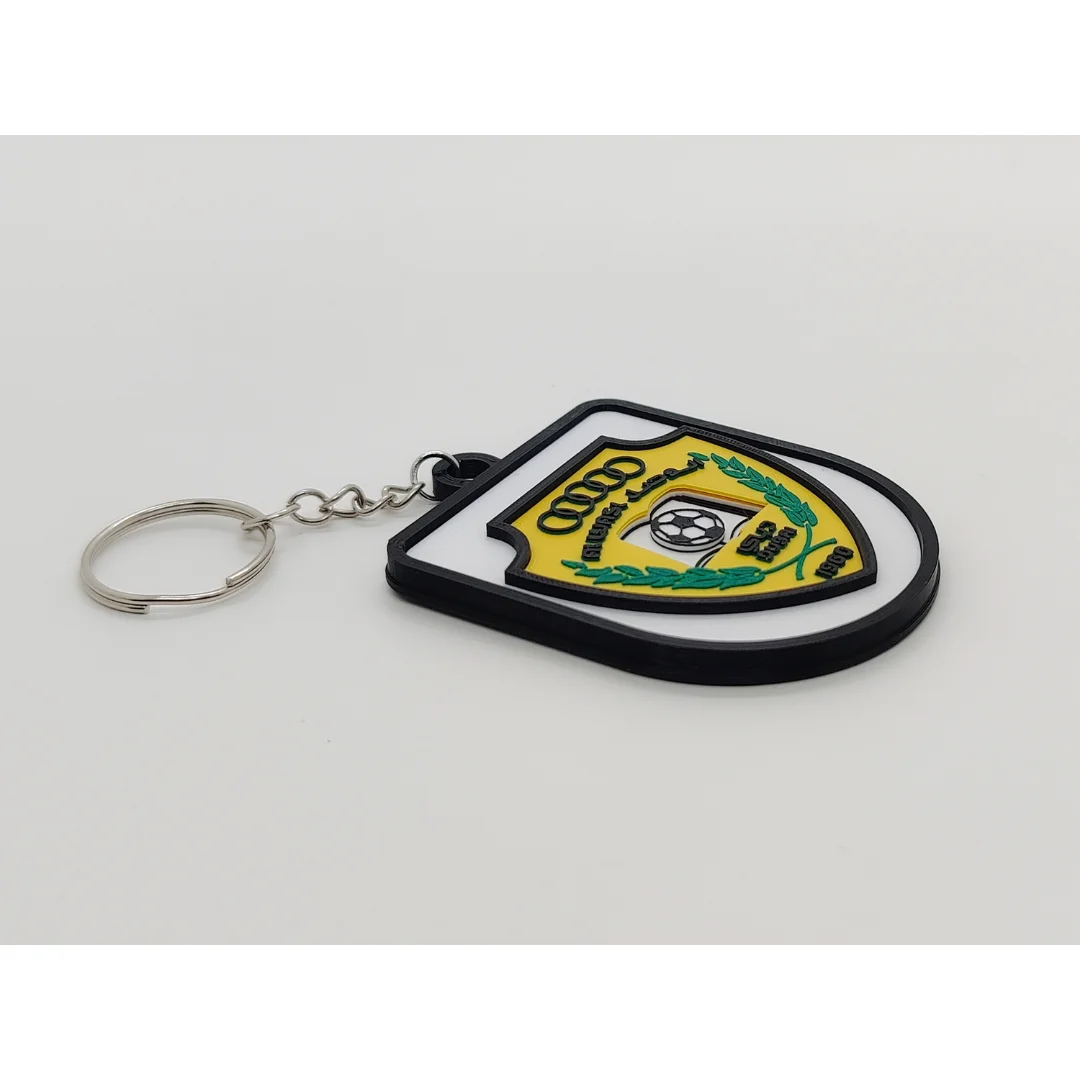 Angled view of the Al Wasl FC keychain showing the club crest and metal key ring.
