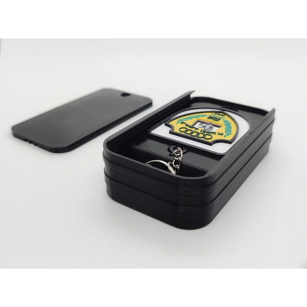 Al Wasl FC keychain displayed inside an open presentation box.