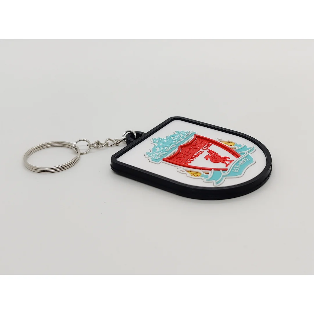 Angled view of the Liverpool FC keychain showing the club crest and metal key ring.