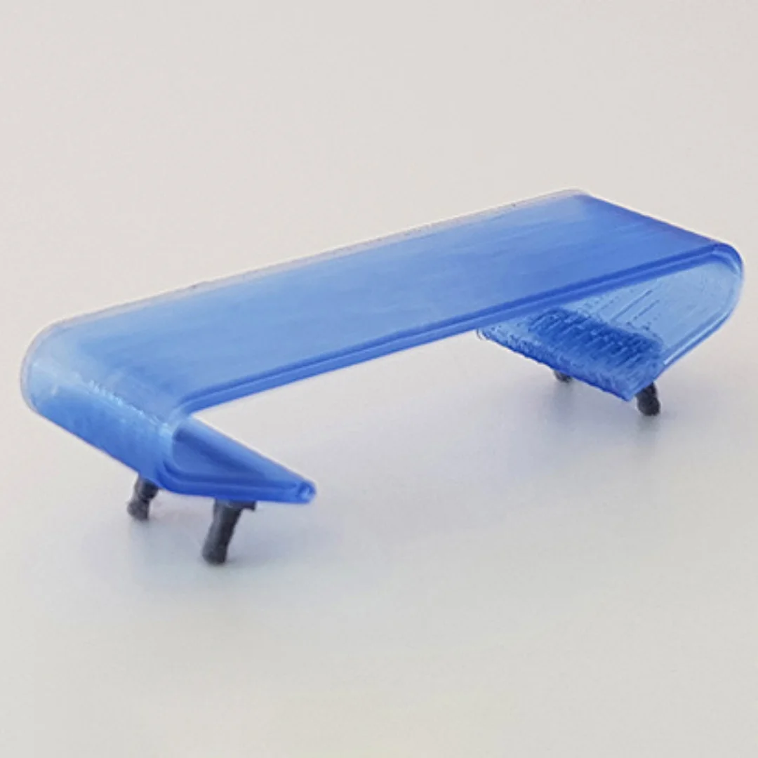 Rounded Coffee Table miniature model at 1:50 scale.