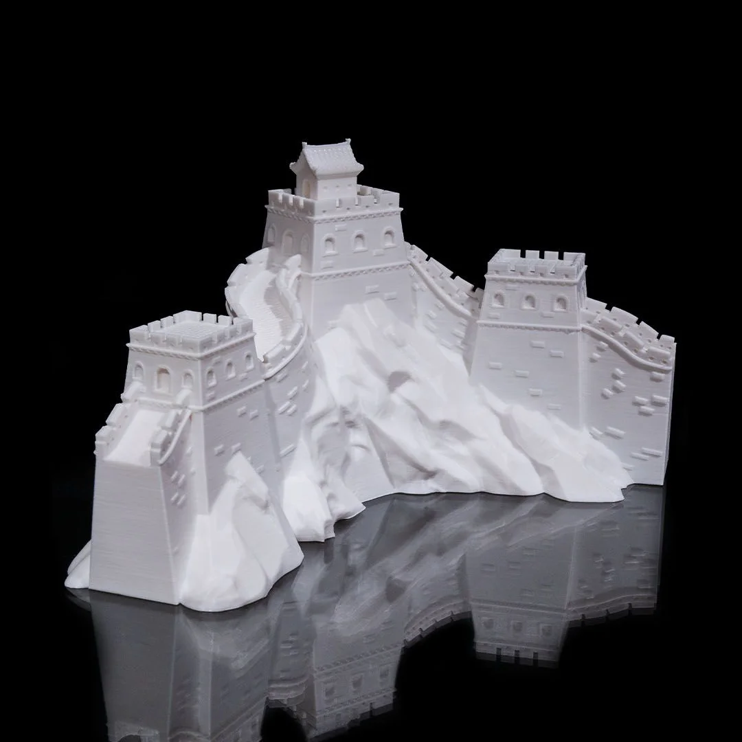 Angled view of a Great Wall of China model showing the staircase and watchtowers.
