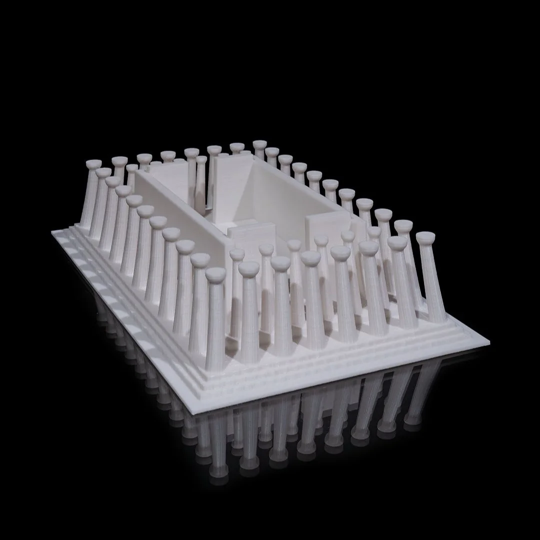 Parthenon model shown without its roof, revealing interior walls and columns.