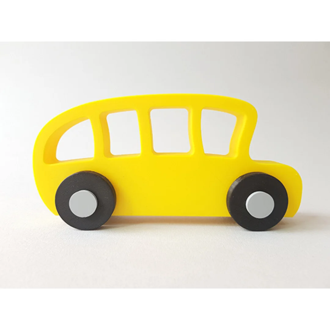 Side view of a 3D printed school bus model with window openings and wheels.