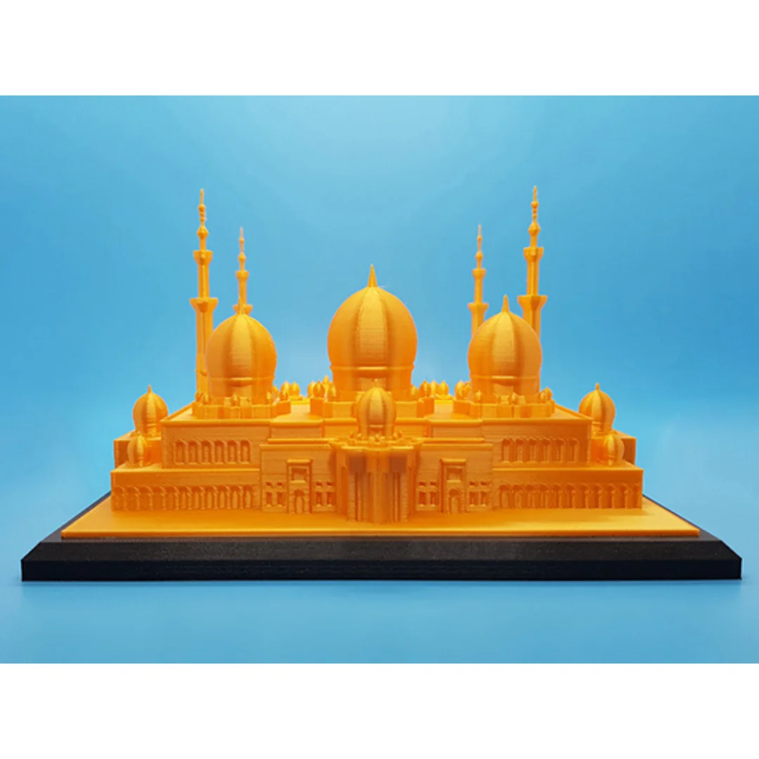 Front view of a Sheikh Zayed Grand Mosque model showing its large domes and entrance.
