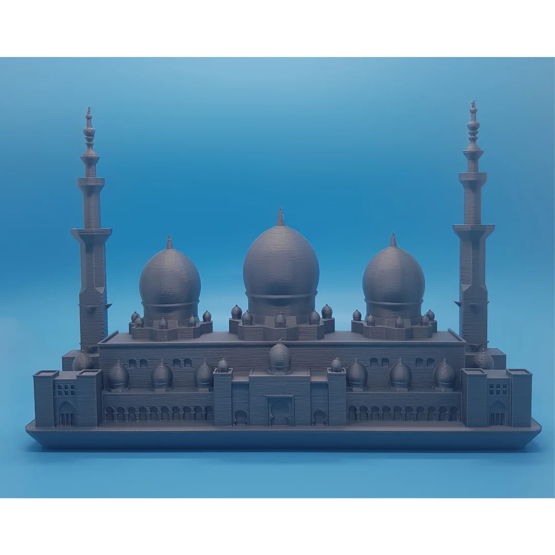 Straight-on view of a Sheikh Zayed Mosque elevation model on its narrow base.